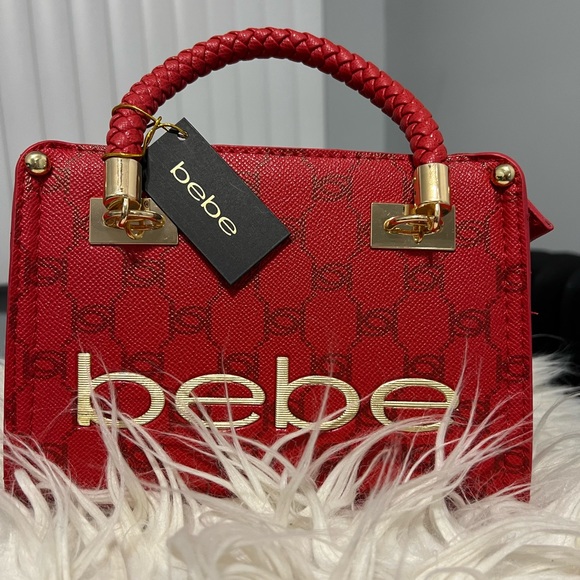 bebe Handbags - SEXY MINI BEBE PURSE